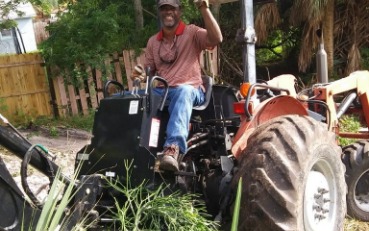 Happy man on the tractor